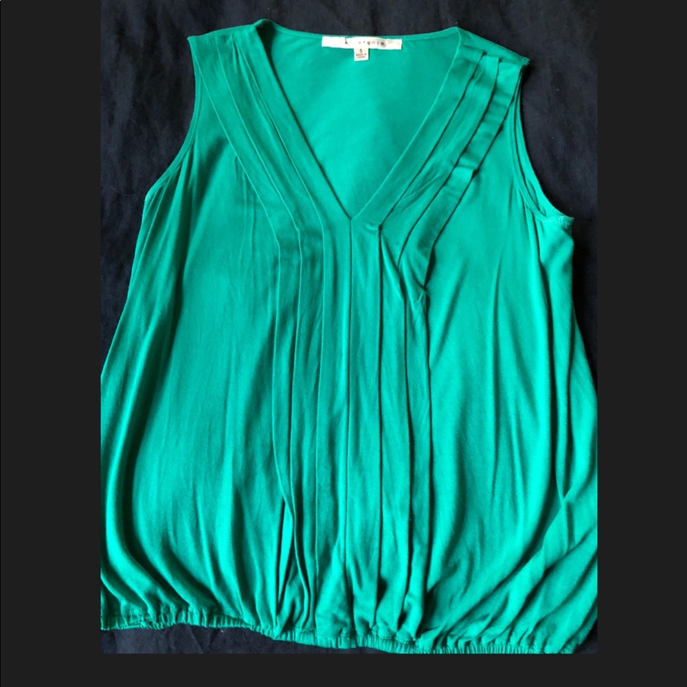 Sleeveless green nylon and spandex v-necked shirt